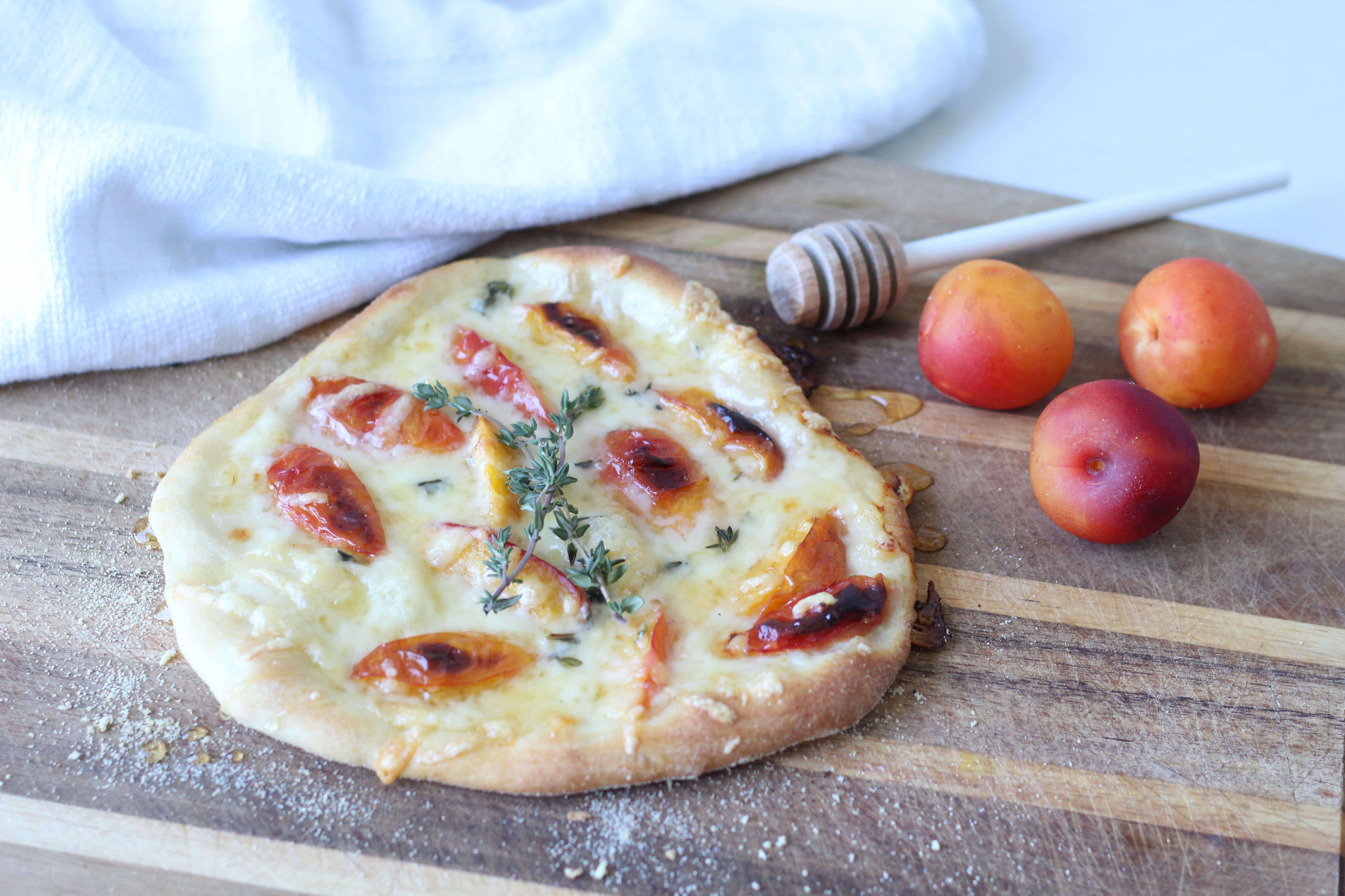 Fraiche Nutrition: Plum, Thyme, and Gouda Pizza