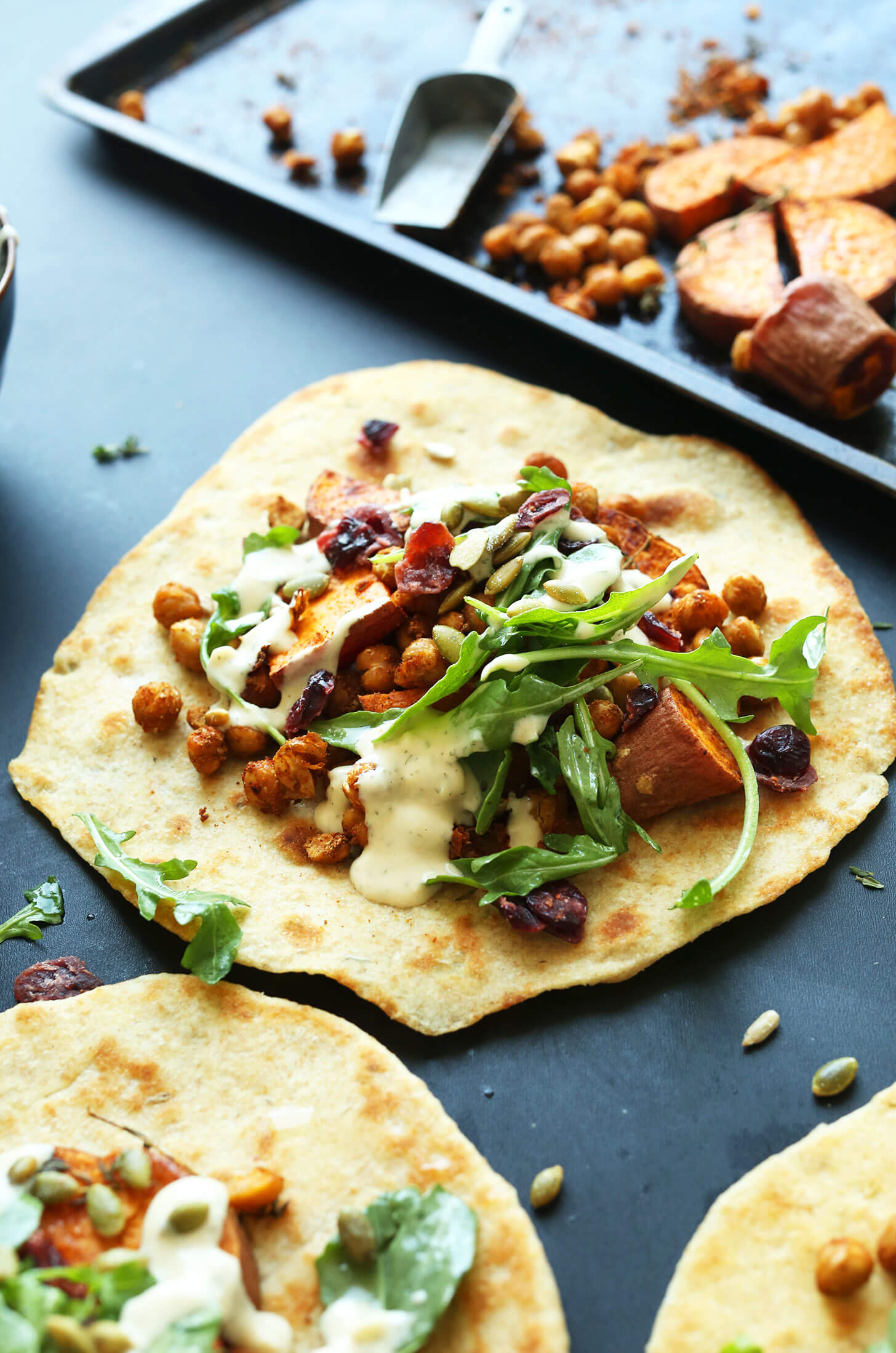 30-minute-FALL-BOUNTY-THANKSGIVING-Wraps-Roasted-Sweet-Potatoes-Chickpeas-with-cranberries-thyme-and-Garlic-Dill-Sauce-vegan-thanksgiving-entree-meal-healthy-recipe-minimalistbaker
